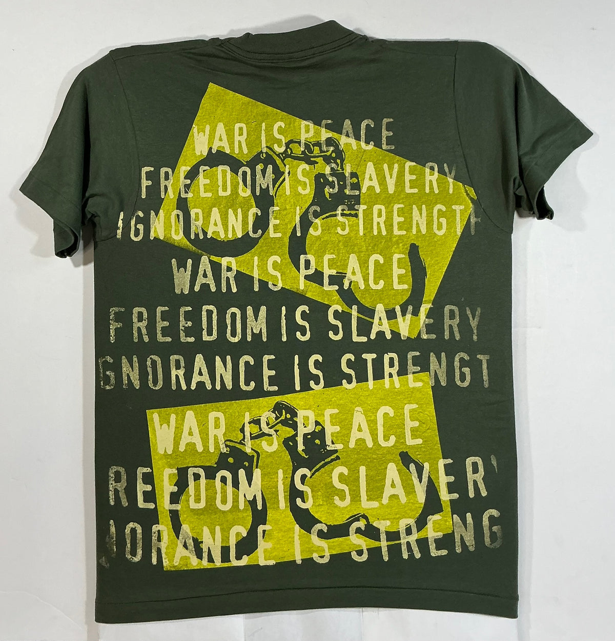 Back of Don Rock Big Brother t-shirt with War Is Peace, Freedom Is Slavery, Ignorance Is Strength print
