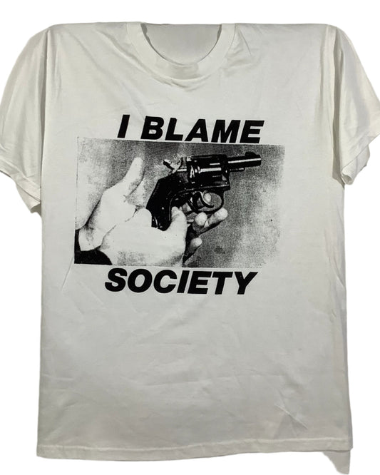 I Blame Society hand screen printed t-shirt by Don Rock, black and white photo of a hand holding a revolver, on a white vintage deadstock tee