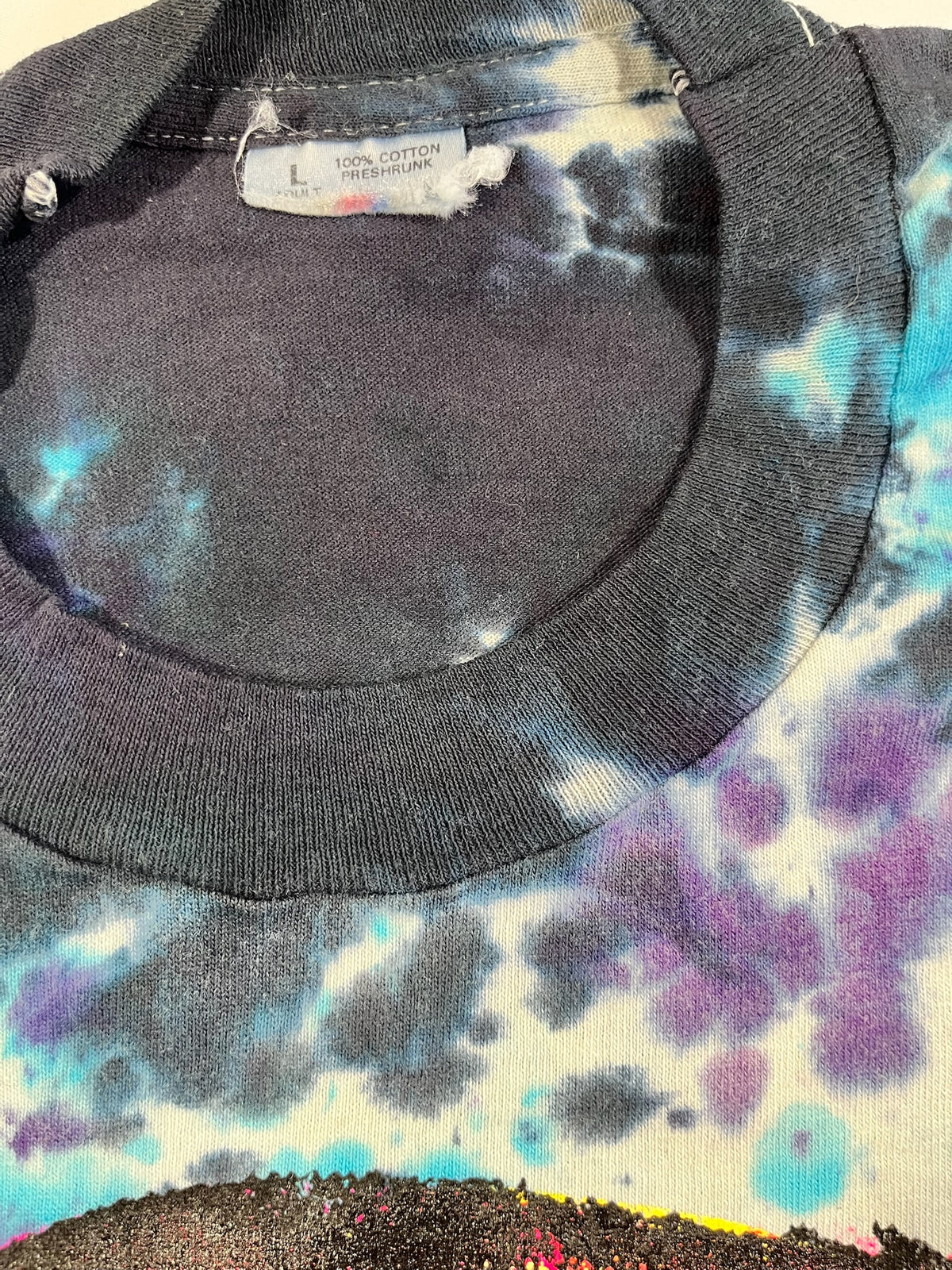 Inside collar of Don Rock Kid Face tie dye t-shirt, vintage deadstock tee with tag removed